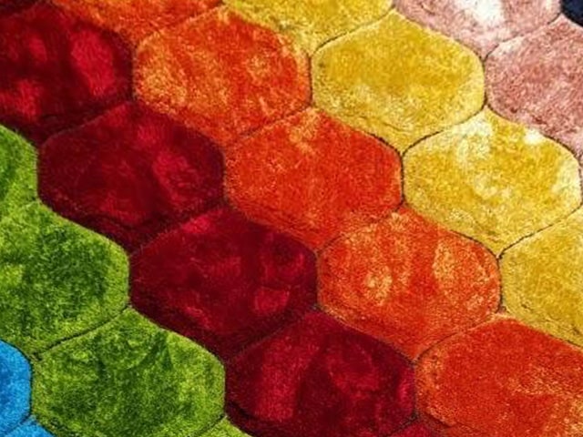 MOQUETTE MM DE PUFFY STYLE 160X230 P549A 21ORANGE/ANTHRACITS DESTOCKA
